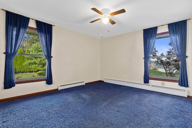 unfurnished room with ceiling fan, carpet flooring, and a baseboard heating unit