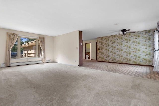 unfurnished living room featuring ceiling fan, baseboard heating, and carpet