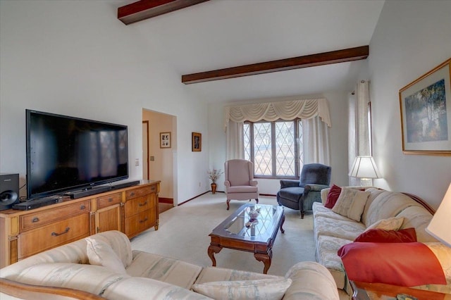 living room with light carpet and beamed ceiling