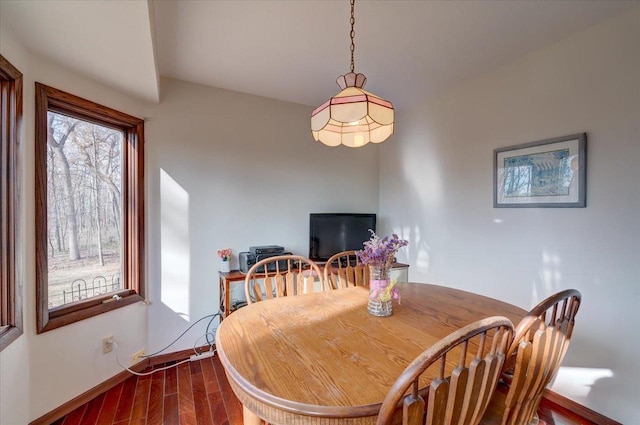 dining area featuring hardwood / wood-style flooring