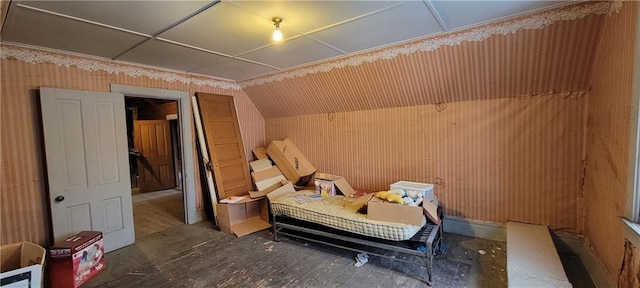 bedroom with lofted ceiling