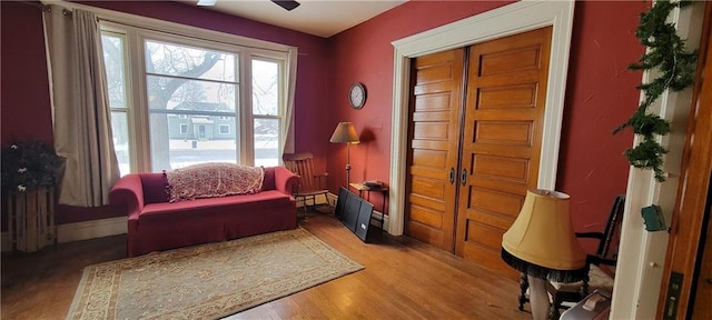 sitting room with light hardwood / wood-style flooring