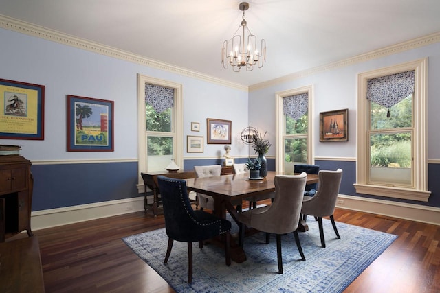 dining space with a chandelier and dark hardwood / wood-style flooring