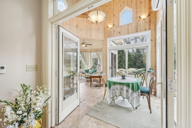 sunroom / solarium featuring french doors