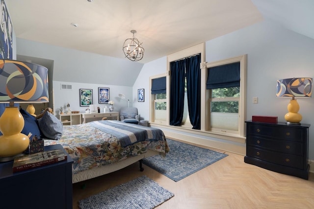 bedroom featuring a chandelier, parquet floors, and lofted ceiling