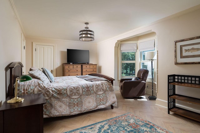 bedroom featuring light parquet flooring and crown molding