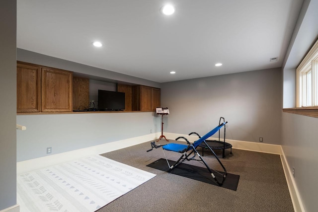 workout room featuring carpet floors