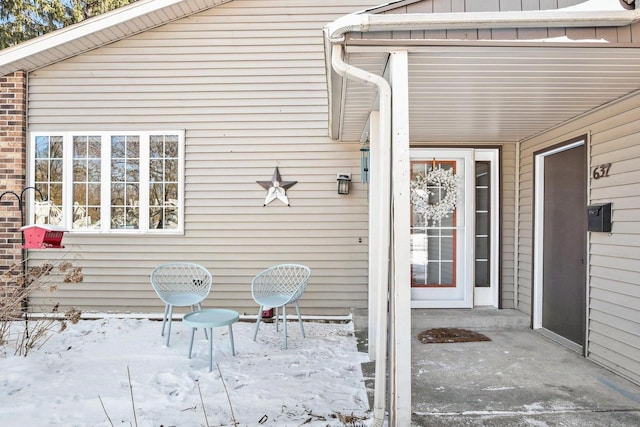 view of snow covered patio