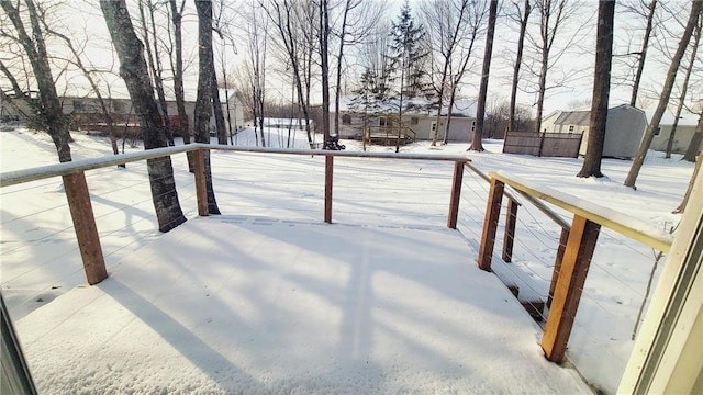 view of yard layered in snow