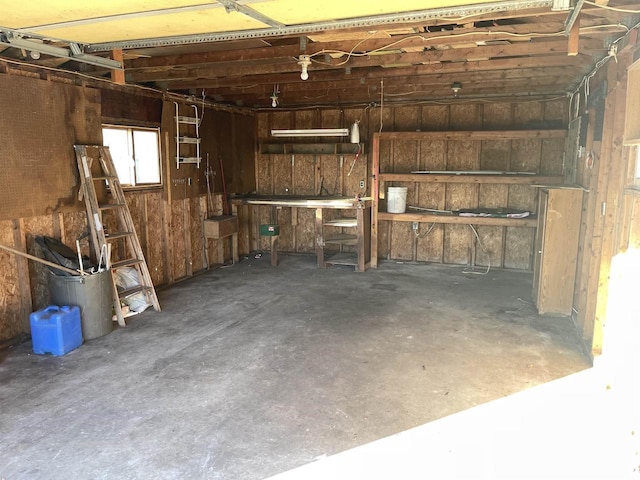 interior space featuring wooden walls