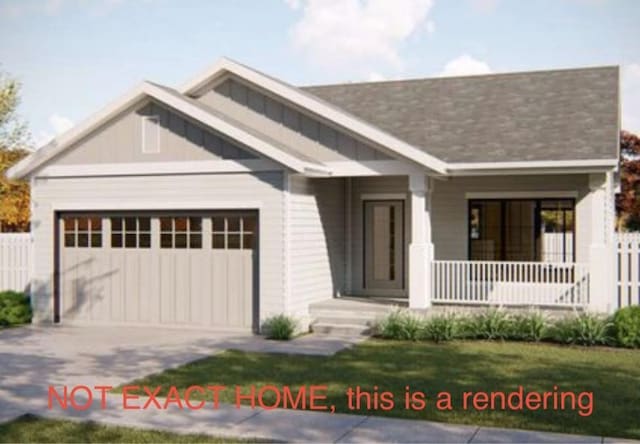 view of front of house with covered porch and a garage