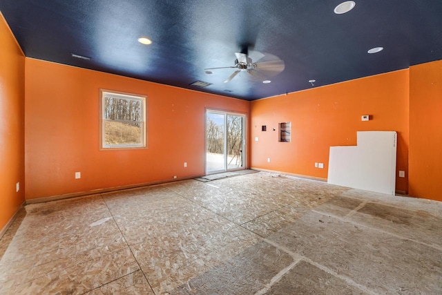 empty room featuring ceiling fan