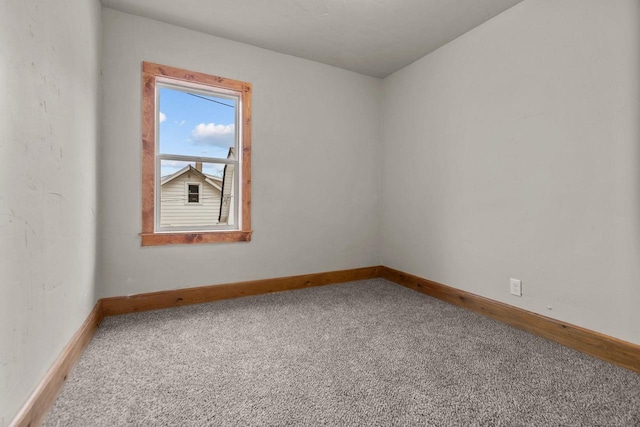 unfurnished room featuring carpet floors