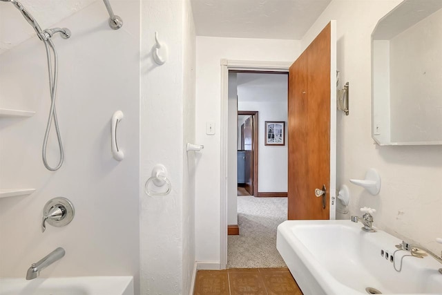 bathroom with shower / bathing tub combination