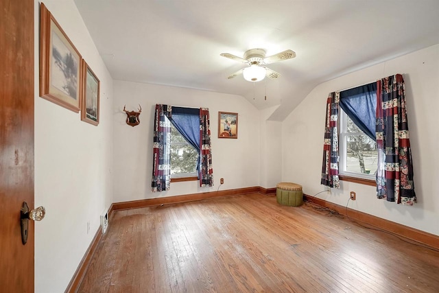 additional living space featuring ceiling fan, hardwood / wood-style floors, and lofted ceiling