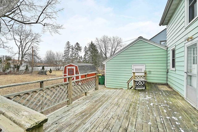 wooden terrace with a storage unit