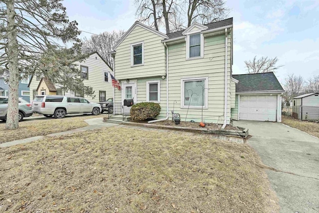 view of front facade with a front yard and a garage