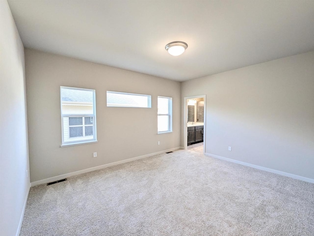 6839 Belle Fontaine Blvd, Middleton, WI 53562 - spare room with light carpet and baseboards