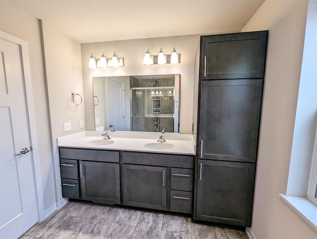 6839 Belle Fontaine Blvd, Middleton, WI 53562 - full bath with a shower stall, double vanity, and baseboards