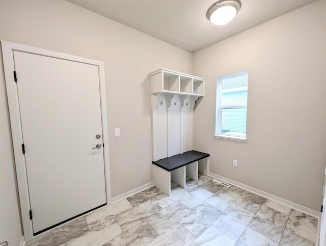 6839 Belle Fontaine Blvd, Middleton, WI 53562 - mudroom featuring light marble finish floors and baseboards