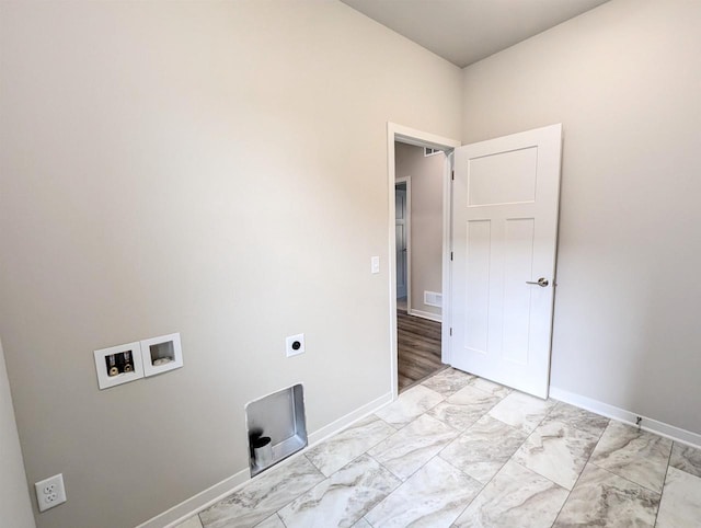6839 Belle Fontaine Blvd, Middleton, WI 53562 - laundry room featuring hookup for a washing machine, hookup for an electric dryer, baseboards, and light marble finish flooring