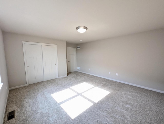 6839 Belle Fontaine Blvd, Middleton, WI 53562 - unfurnished bedroom with light colored carpet, baseboards, and a closet