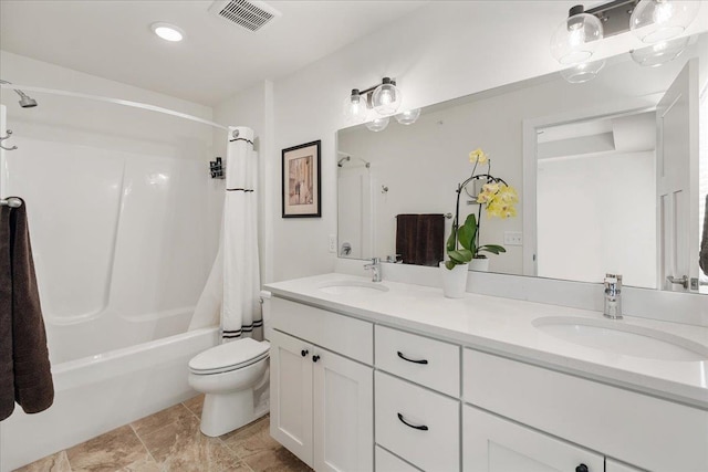 full bathroom featuring toilet, vanity, and shower / bathtub combination with curtain