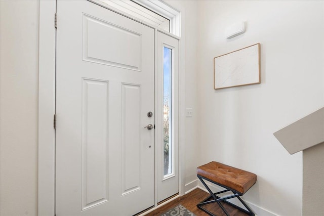 entryway featuring dark wood-type flooring