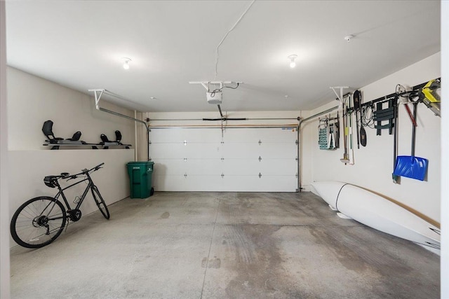 garage featuring a garage door opener