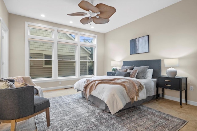 carpeted bedroom featuring ceiling fan