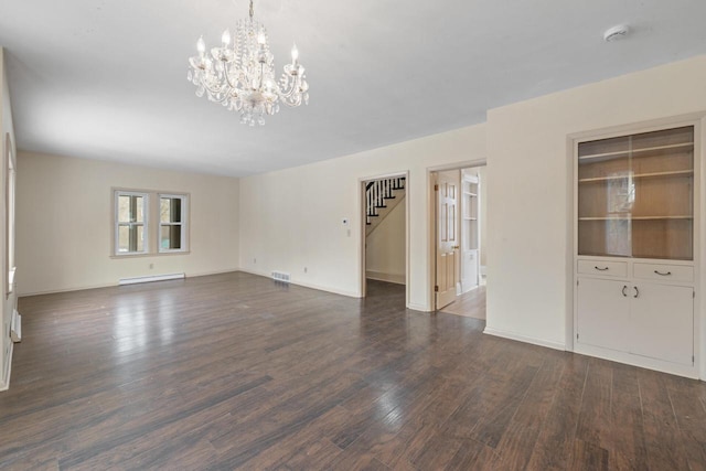 unfurnished living room with baseboard heating, dark hardwood / wood-style floors, and an inviting chandelier