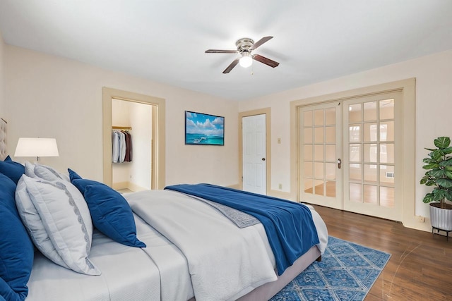 bedroom with ceiling fan, dark wood-type flooring, and french doors