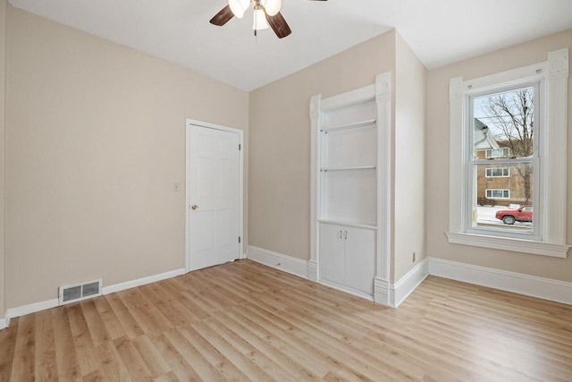 unfurnished bedroom featuring ceiling fan and light hardwood / wood-style floors