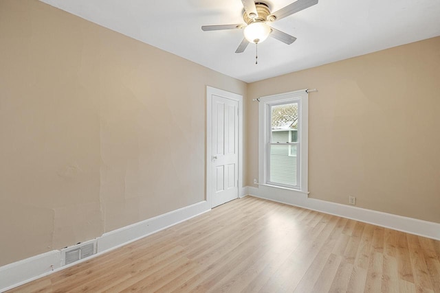 unfurnished room with light hardwood / wood-style floors and ceiling fan