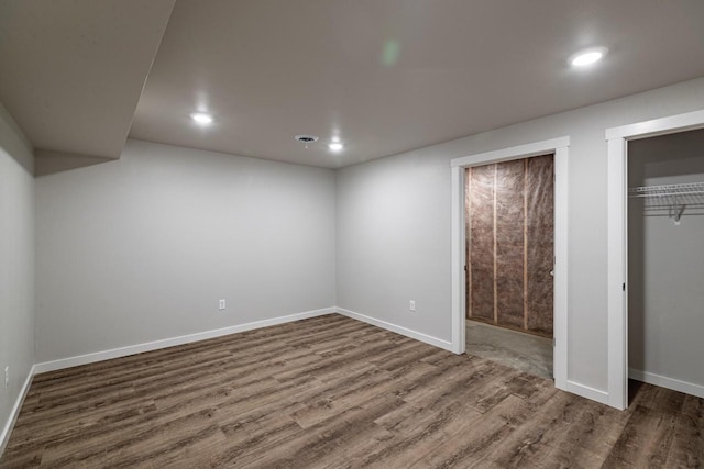 unfurnished bedroom featuring wood-type flooring