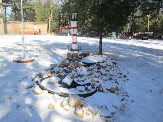 view of yard covered in snow