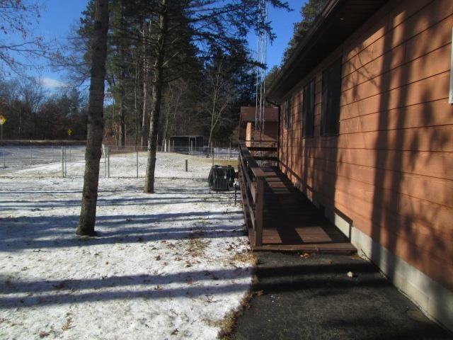 view of yard covered in snow