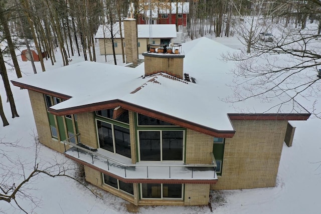 view of snow covered property