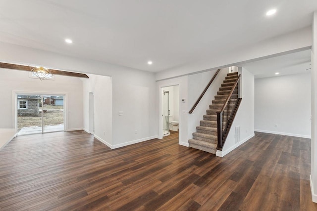 unfurnished room with dark hardwood / wood-style floors