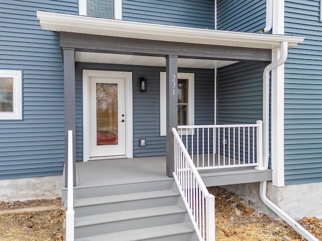 entrance to property with covered porch