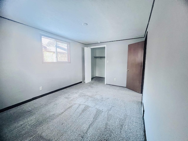 unfurnished bedroom featuring carpet floors