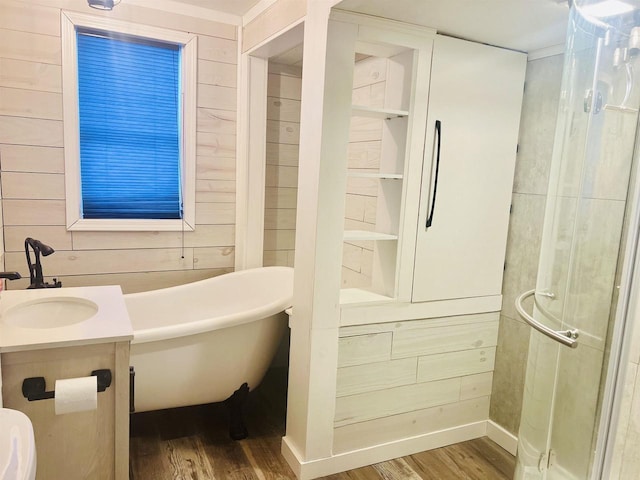 bathroom with independent shower and bath, hardwood / wood-style floors, and wooden walls