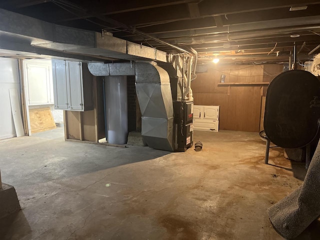 basement featuring heating unit