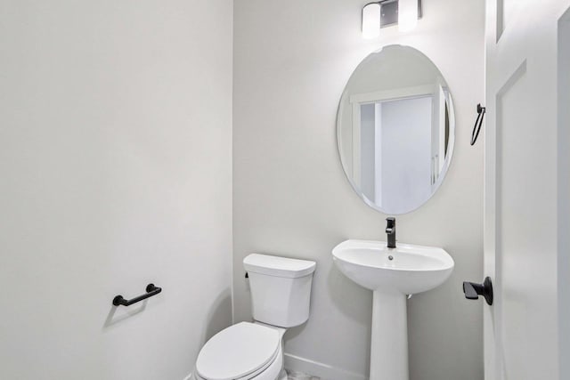 6635 Royal View Dr, Deforest, WI 53532 - bathroom with toilet and baseboards