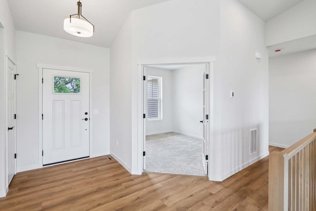 6635 Royal View Dr, Deforest, WI 53532 - foyer with light wood-type flooring and baseboards
