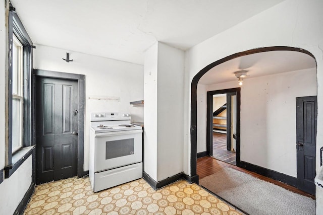 kitchen featuring white electric range oven