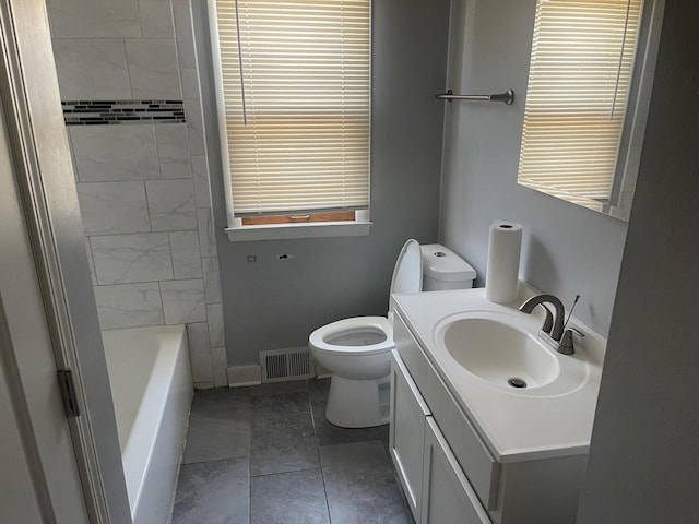 full bathroom featuring toilet, shower with separate bathtub, and vanity