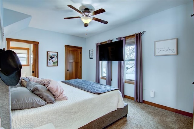 carpeted bedroom featuring ceiling fan