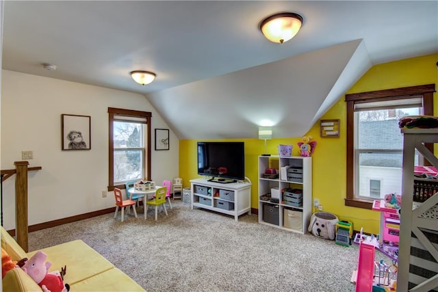 game room featuring a wealth of natural light, carpet flooring, and lofted ceiling