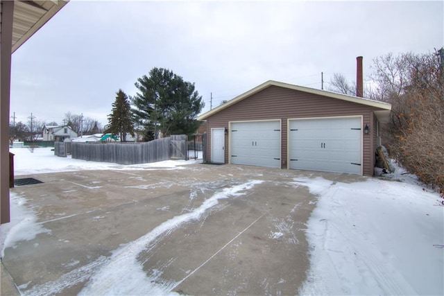 view of snow covered garage